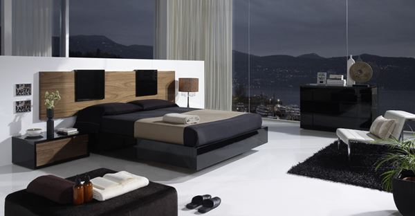 Bedroom-with-black-furniture-and-modern-rug