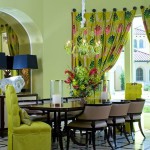 Green-dining-room-with-floral-curtains